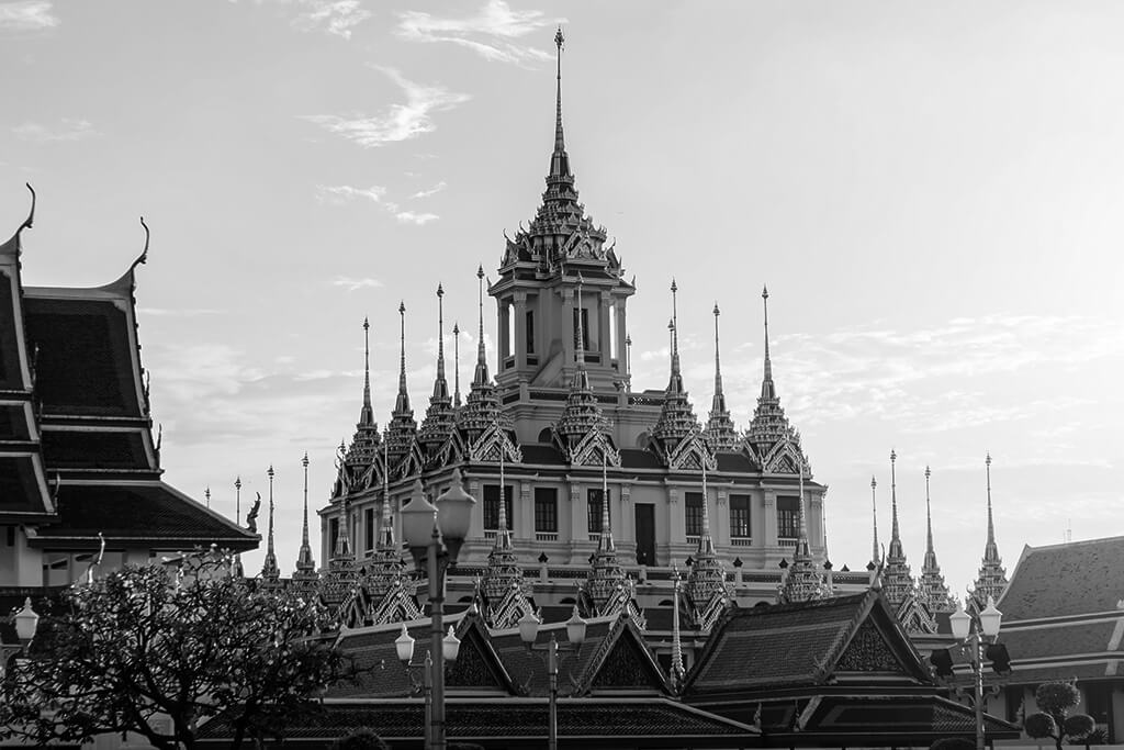 Black and white photo of the Loha Prasat temple in Bangkok, Thailand.